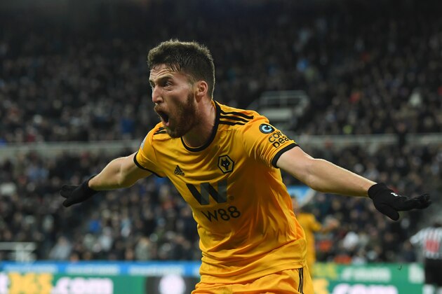 NEWCASTLE UPON TYNE, ENGLAND - DECEMBER 09:  Matt Doherty of Wolverhampton Wanderers celebrates after scoring his team's second goal during the Premier League match between Newcastle United and Wolverhampton Wanderers at St. James Park on December 9, 2018 in Newcastle upon Tyne, United Kingdom.  (Photo by Stu Forster/Getty Images)