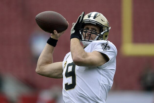 New Orleans Saints quarterback Drew Brees (9) throws a pass before an NFL football game against the Tampa Bay Buccaneers Sunday, Dec. 9, 2018, in Tampa, Fla. (AP Photo/Jason Behnken)