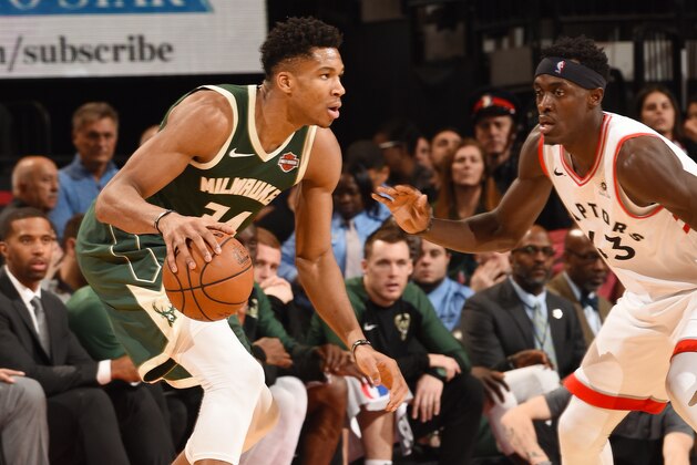 TORONTO, CANADA - DECEMBER 9: Giannis Antetokounmpo #34 of the Milwaukee Bucks dribbles the ball during the game against the Toronto Raptors on December 9, 2018 at the Scotiabank Arena in Toronto, Ontario, Canada.  NOTE TO USER: User expressly acknowledges and agrees that, by downloading and or using this Photograph, user is consenting to the terms and conditions of the Getty Images License Agreement.  Mandatory Copyright Notice: Copyright 2018 NBAE (Photo by Ron Turenne/NBAE via Getty Images)
