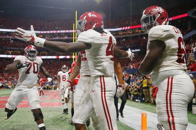 ATLANTA, GA - DECEMBER 01:  Jerry Jeudy #4 of the Alabama Crimson Tide celebrates with teammates after scoring a touchdown against the Georgia Bulldogs in the fourth quarter during the 2018 SEC Championship Game at Mercedes-Benz Stadium on December 1, 2018 in Atlanta, Georgia.  (Photo by Kevin C. Cox/Getty Images)