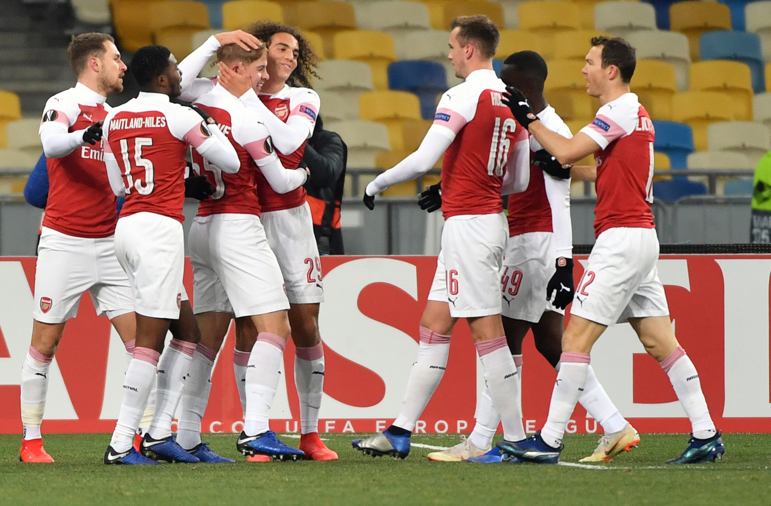 Arsenal players celebrate a goal during UEFA Europa League, Group E, football match Vorskla FC vs Arsenal FC at the Olympiyski Stadium in Kiev on November 29, 2018. (Photo by SERGEI SUPINSKY / AFP)        (Photo credit should read SERGEI SUPINSKY/AFP/Getty Images)