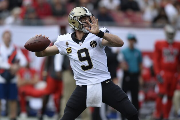 New Orleans Saints quarterback Drew Brees (9) throws a pass against the Tampa Bay Buccaneers during the first half of an NFL football game Sunday, Dec. 9, 2018, in Tampa, Fla. (AP Photo/Jason Behnken)