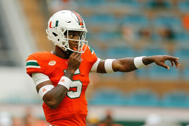 MIAMI GARDENS, FL - NOVEMBER 24:  N'Kosi Perry #5 of the Miami Hurricanes looks on against the Pittsburgh Panthers at Hard Rock Stadium on November 24, 2018 in Miami Gardens, Florida.  (Photo by Michael Reaves/Getty Images)