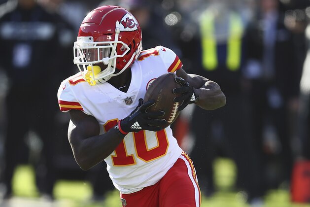 Kansas City Chiefs wide receiver Tyreek Hill (10) runs against the Oakland Raiders during the first half of an NFL football game in Oakland, Calif., Sunday, Dec. 2, 2018. (AP Photo/Ben Margot)