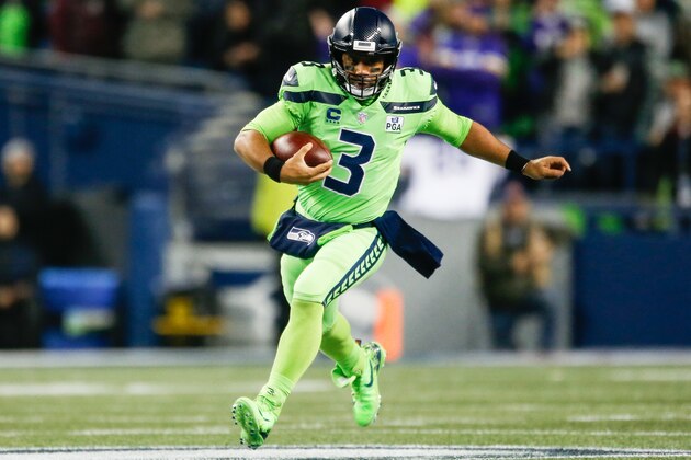 SEATTLE, WA - DECEMBER 10: Russell Wilson #3 of the Seattle Seahawks runs the ball for a first down in the second quarter against the Minnesota Vikings at CenturyLink Field on December 10, 2018 in Seattle, Washington. (Photo by Otto Greule Jr/Getty Images)