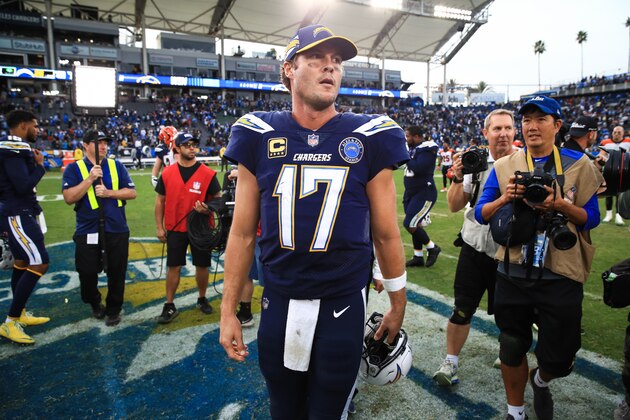 CARSON, CA - DECEMBER 09: Quarterback Philip Rivers #17 of the Los Angeles Chargers walks off the field after a 26-21 win over the Cincinnati Bengals at StubHub Center on December 9, 2018 in Carson, California. (Photo by Sean M. Haffey/Getty Images)