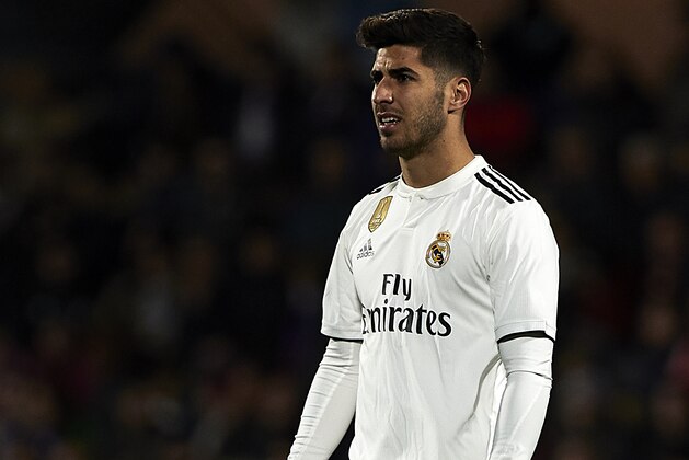 HUESCA, SPAIN - DECEMBER 09: Marco Asensio of Real Madrid looks on during the La Liga match between Sociedad Deportiva Huesca and Real Madrid at Estadio El Alcoraz on December 09, 2018 in Huesca, Spain. (Photo by Quality Sport Images/Getty Images)