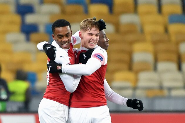 Arsenal's players celebrate after scoring during the UEFA Europa League Group E football match between Vorskla and Arsenal at the Olympiyski Stadium, in Kiev, on November 29, 2018. (Photo by SERGEI SUPINSKY / AFP)        (Photo credit should read SERGEI SUPINSKY/AFP/Getty Images)