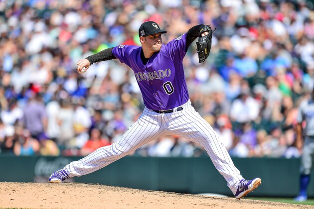 DENVER, CO - AUGUST 12:  Adam Ottavino #0 of the Colorado Rockies pitches against the Los Angeles Dodgers  at Coors Field on August 12, 2018 in Denver, Colorado. (Photo by Dustin Bradford/Getty Images)