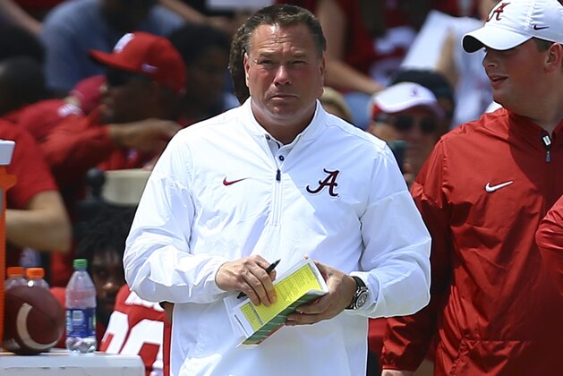 FILE - In this April 21, 2018, file photo, former Tennessee coach Butch Jones, now an analyst for Alabama, watches from the sidelines during the first half of the Crimson Tide's spring NCAA college football game in Tuscaloosa, Ala. The top-ranked Crimson Tide face Tennessee on Saturday.(AP Photo/Butch Dill, File)