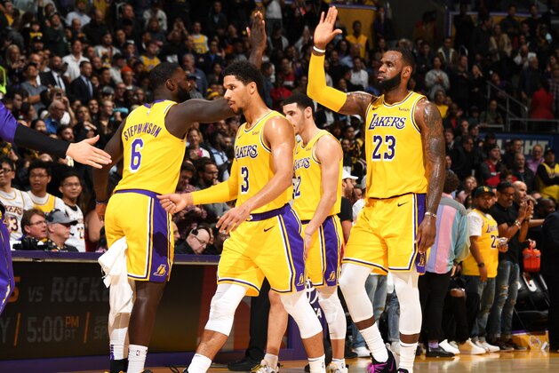 LOS ANGELES, CA - DECEMBER 10: LeBron James #23 of the Los Angeles Lakers hi-fives teammates during the game against the Miami Heat on December 10, 2018 at STAPLES Center in Los Angeles, California. NOTE TO USER: User expressly acknowledges and agrees that, by downloading and/or using this Photograph, user is consenting to the terms and conditions of the Getty Images License Agreement. Mandatory Copyright Notice: Copyright 2018 NBAE (Photo by Andrew D. Bernstein/NBAE via Getty Images)