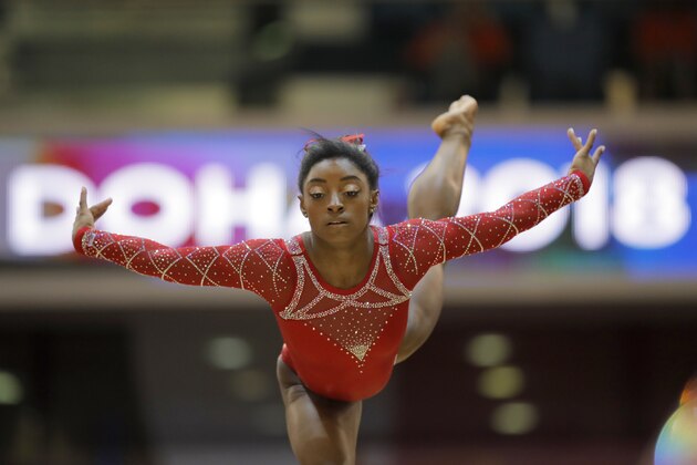 Simone Biles of the U.S. warms up on the second and last day of the apparatus finals of the Gymnastics World Championships at the Aspire Dome in Doha, Qatar, Saturday, Nov. 3, 2018. (AP Photo/Vadim Ghirda)