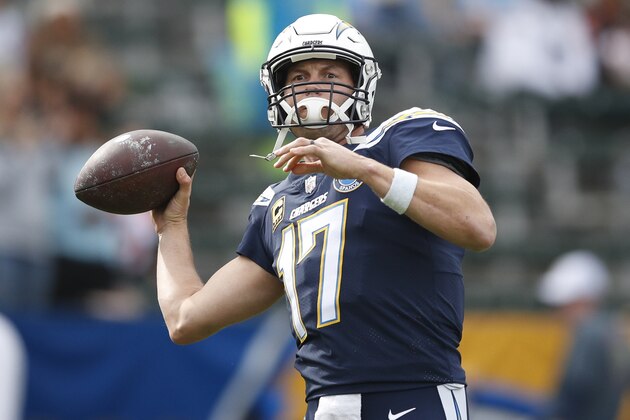 Los Angeles Chargers quarterback Philip Rivers warms up before the start of an NFL football game Sunday, Dec. 9, 2018, in Carson, Calif. (AP Photo/Jae C. Hong )