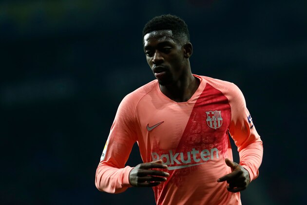 Barcelona's French forward Ousmane Dembele runs during the Spanish league football match RCD Espanyol against FC Barcelona at the RCDE Stadium in Cornella de Llobregat on December 8, 2018. (Photo by PAU BARRENA / AFP)        (Photo credit should read PAU BARRENA/AFP/Getty Images)