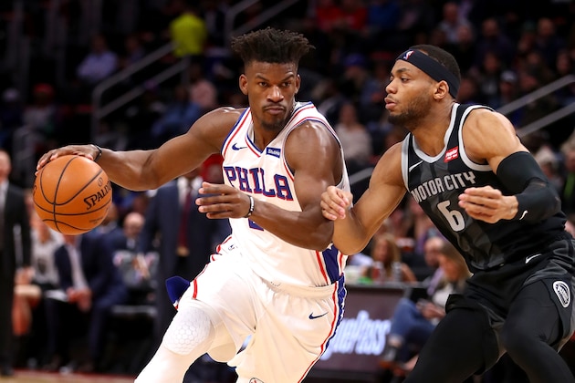 DETROIT, MICHIGAN - DECEMBER 07:  Jimmy Butler #23 of the Philadelphia 76ers drives around Bruce Brown #6 of the Detroit Pistons during the first half at Little Caesars Arena on December 07, 2018 in Detroit, Michigan. NOTE TO USER: User expressly acknowledges and agrees that, by downloading and or using this photograph, User is consenting to the terms and conditions of the Getty Images License  (Photo by Gregory Shamus/Getty Images)