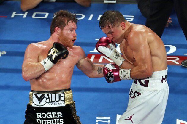 LAS VEGAS, NV - SEPTEMBER 15: Saul Canelo Alvarez and Gennady Golovkin fight during the WBC-WBA-IBO Ring Middleweight Title bout at T-Mobile Arena on September 15, 2018 in Las Vegas, Nevada. (Photo by Omar Vega/Getty Images)
