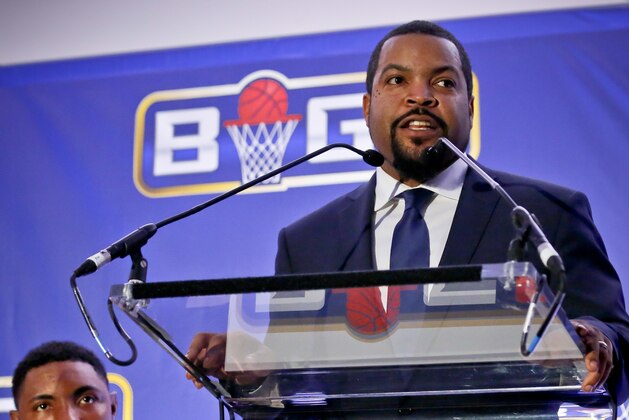 FILE - In this Jan. 11, 2017, file photo, entertainer Ice Cube, right, announces the launch of the Big3 professional basketball league as former NBA player and players union deputy Roger Mason, left, looks on, in New York. Ice Cube says his Big3 basketball league is open to moving its championship game to another arena in Las Vegas to make way for Floyd Mayweather's boxing match against Conor McGregor. The game is scheduled for Aug. 26 at T-Mobile Arena, the biggest venue in Las Vegas. Mayweather's fight against McGregor was later announced for the same site. (AP Photo/Bebeto Matthews)