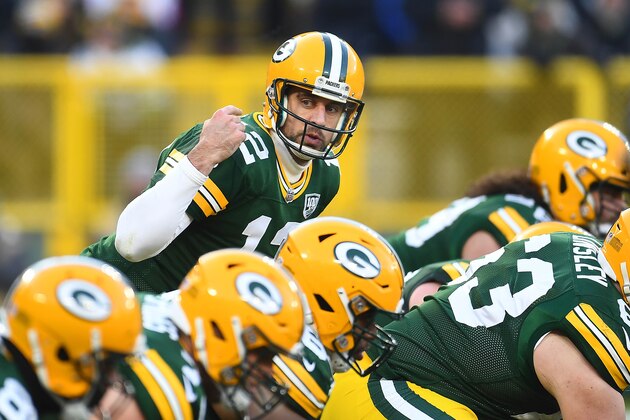 GREEN BAY, WISCONSIN - DECEMBER 09:  Aaron Rodgers #12 of the Green Bay Packers calls a play at the line during a game against the Atlanta Falcons at Lambeau Field on December 09, 2018 in Green Bay, Wisconsin.   The Packers defeated the Falcons 34-20.  (Photo by Stacy Revere/Getty Images)