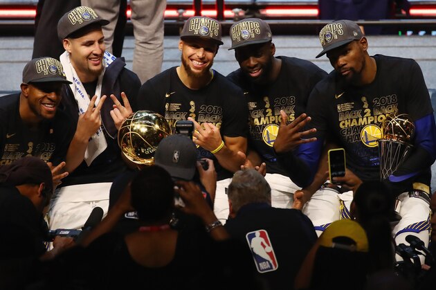 CLEVELAND, OH - JUNE 08:  Andre Iguodala #9, Klay Thompson #11, Stephen Curry #30, Draymond Green #23 and Kevin Durant #35 of the Golden State Warriors celebrate after defeating the Cleveland Cavaliers during Game Four of the 2018 NBA Finals at Quicken Loans Arena on June 8, 2018 in Cleveland, Ohio. The Warriors defeated the Cavaliers 108-85 to win the 2018 NBA Finals. NOTE TO USER: User expressly acknowledges and agrees that, by downloading and or using this photograph, User is consenting to the terms and conditions of the Getty Images License Agreement.  (Photo by Justin K. Aller/Getty Images)