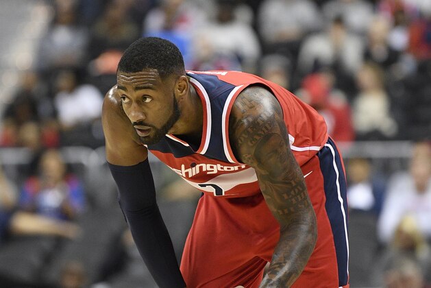 Washington Wizards guard John Wall (2) dribbles the ball during the first half of an NBA basketball game against the Brooklyn Nets, Saturday, Dec. 1, 2018, in Washington. (AP Photo/Nick Wass)