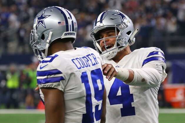 ARLINGTON, TEXAS - DECEMBER 09: Amari Cooper #19 of the Dallas Cowboys celebrates his second touchdown with Dak Prescott #4 against the Philadelphia Eagles at AT&T Stadium on December 09, 2018 in Arlington, Texas. (Photo by Richard Rodriguez/Getty Images)