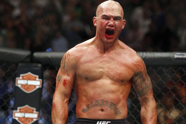 FILE - In this July 11, 2015, file photo, Robbie Lawler celebrates after defeating Rory MacDonald in  their welterweight title fight mixed martial arts bout at UFC 189 in Las Vegas. Lawler believes he can avoid the upset bug that hit the majority of the UFC's champions during a tumultuous 2015. The welterweight king expects violence and victory Saturday when he takes on Carlos Condit at UFC 195 in Las Vegas. (AP Photo/John Locher, File)