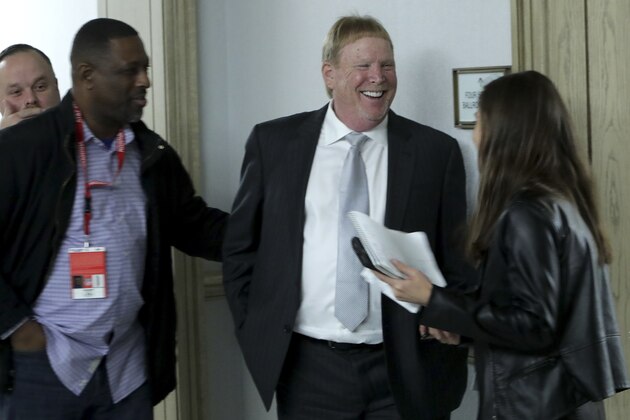 Oakland Raiders owner Mark Davis smiles while speaking to reporters after the NFL football leagues meeting in Irving, Texas, Wednesday, Dec. 12, 2018. (AP Photo/LM Otero)