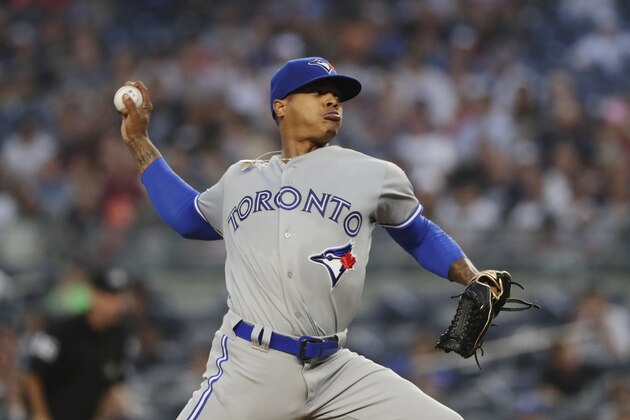 Toronto Blue Jays' Marcus Stroman delivers a pitch during the first inning of a baseball game against the New York Yankees, Friday, Aug. 17, 2018, in New York. (AP Photo/Frank Franklin II)