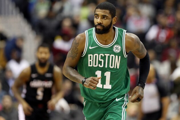 WASHINGTON, DC - DECEMBER 12: Kyrie Irving #11 of the Boston Celtics runs up the floor against the Washington Wizards in the first half at Capital One Arena on December 12, 2018 in Washington, DC. NOTE TO USER: User expressly acknowledges and agrees that, by downloading and or using this photograph, User is consenting to the terms and conditions of the Getty Images License Agreement. (Photo by Rob Carr/Getty Images)