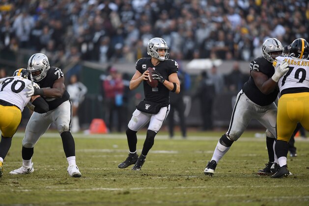 OAKLAND, CA - DECEMBER 09:  Derek Carr #4 of the Oakland Raiders looks to pass against the Pittsburgh Steelers during the second half of an NFL football game at Oakland-Alameda County Coliseum on December 9, 2018 in Oakland, California.  (Photo by Thearon W. Henderson/Getty Images)