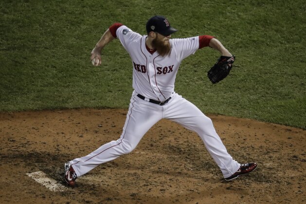 Boston Red Sox's Craig Kimbrel throws during the ninth inning of Game 2 of the World Series baseball game against the Los Angeles Dodgers Wednesday, Oct. 24, 2018, in Boston. (AP Photo/Charles Krupa)