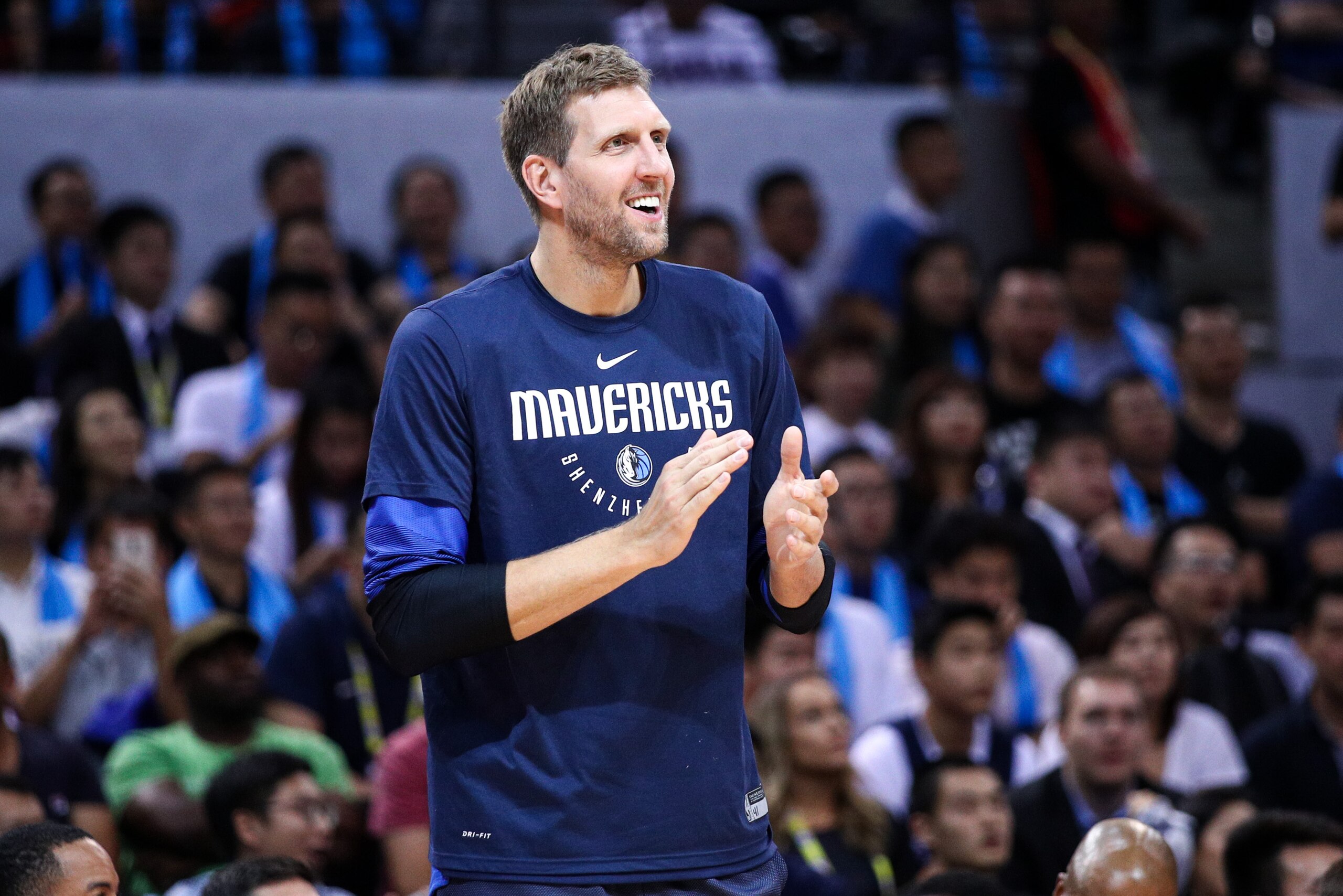 SHENZHEN, CHINA - OCTOBER 08: Dirk Nowitzki #41 of the Dallas Mavericks reacts during the 2018 NBA China Games match between the Dallas Mavericks and the Philadelphia 76ers at Universidade Center on October 8, 2018 in Shenzhen, China. NOTE TO USER: User expressly acknowledges and agrees that, by downloading and or using this photograph, User is consenting to the terms and conditions of the Getty Images License Agreement. (Photo by Zhong Zhi/Getty Images) SHENZHEN, CHINA - OCTOBER 08: Dirk Nowitzki #41 of the Dallas Mavericks reacts during the 2018 NBA China Games match between the Dallas Mavericks and the Philadelphia 76ers at Universidade Center on October 8, 2018 in Shenzhen, China. NOTE TO USER: User expressly acknowledges and agrees that, by downloading and or using this photograph, User is consenting to the terms and conditions of the Getty Images License Agreement. (Photo by Zhong Zhi/Getty Images)