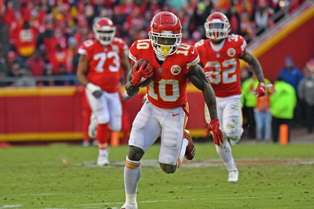 KANSAS CITY, MO - DECEMBER 09:  Wide receiver Tyreek Hill #10 of the Kansas City Chiefs turns up field after catching a pass on a fourth down play late in the second half against the Baltimore Ravens on December 9, 2018 at Arrowhead Stadium in Kansas City, Missouri.  (Photo by Peter G. Aiken/Getty Images)