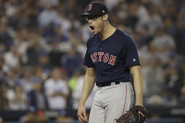 Boston Red Sox's pitcher Joe Kelly reacts after ending the eighth inning in Game 5 of the World Series baseball game against the Los Angeles Dodgers on Sunday, Oct. 28, 2018, in Los Angeles. (AP Photo/David J. Phillip)