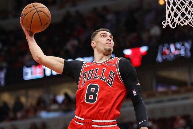 CHICAGO, ILLINOIS - DECEMBER 10: Zach LaVine #8 of the Chicago Bulls goes up for a dunk against the Sacramento Kings at the United Center on December 10, 2018 in Chicago, Illinois. NOTE TO USER: User expressly acknowledges and agrees that, by downloading and or using this photograph, User is consenting to the terms and conditions of the Getty Images License Agreement.  (Photo by Jonathan Daniel/Getty Images)