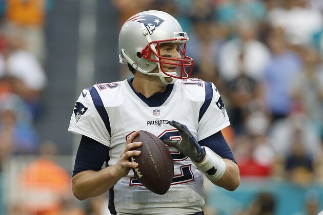 MIAMI, FL - DECEMBER 09:  Tom Brady #12 of the New England Patriots throws a pass against the Miami Dolphins at Hard Rock Stadium on December 9, 2018 in Miami, Florida.  (Photo by Michael Reaves/Getty Images)
