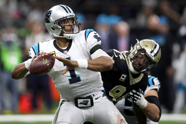 NEW ORLEANS, LA - JANUARY 07:  Cam Newton #1 of the Carolina Panthers is sacked by Cameron Jordan #94 of the New Orleans Saints at the Mercedes-Benz Superdome on January 7, 2018 in New Orleans, Louisiana.  (Photo by Chris Graythen/Getty Images)