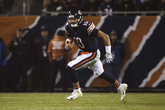 Chicago Bears quarterback Mitchell Trubisky (10) runs the ball against the Los Angeles Rams during the first half of an NFL football game Sunday, Dec. 9, 2018, in Chicago. (AP Photo/David Banks)