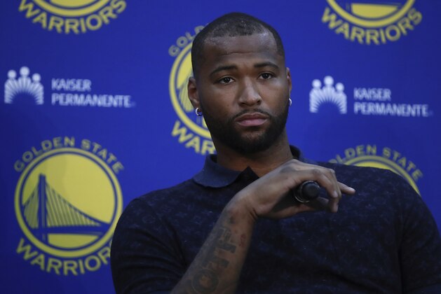 Golden State Warriors' DeMarcus Cousins ponders a question from a reporter during a media conference Thursday, July 19, 2018, in Oakland, Calif. Cousins signed a one-year, $5.3M deal with the defending champion Warriors. (AP Photo/Ben Margot)