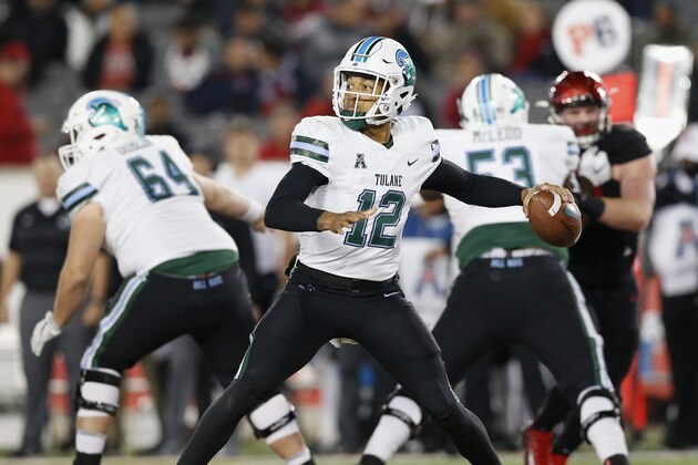 HOUSTON, TX - NOVEMBER 15:  Justin McMillan #12 of the Tulane Green Wave throws a pass in the second half against the Houston Cougars at TDECU Stadium on November 15, 2018 in Houston, Texas.  (Photo by Tim Warner/Getty Images)
