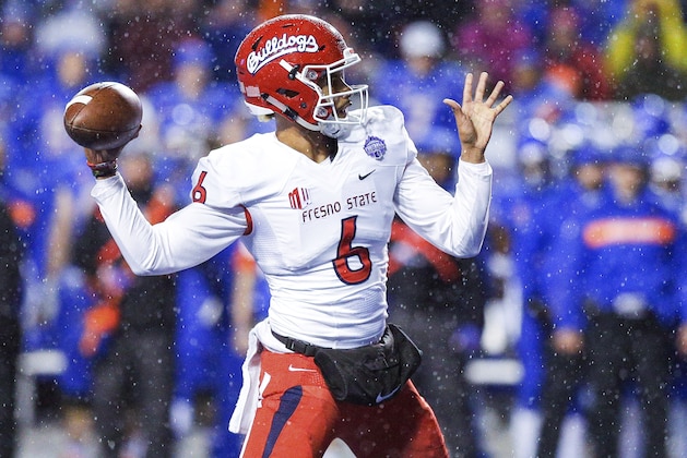 Fresno State quarterback Marcus McMaryion (6) throws a touchdown pass against Boise State during the first half of an NCAA college football game for the Mountain West championship, Saturday, Dec. 1, 2018, in Boise, Idaho. (AP Photo/Steve Conner)