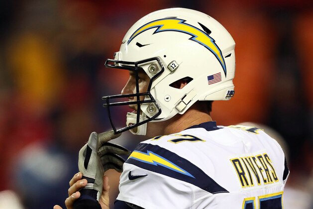 KANSAS CITY, MISSOURI - DECEMBER 13:  Quarterback Philip Rivers #17 of the Los Angeles Chargers warms up prior to the game against the Kansas City Chiefs at Arrowhead Stadium on December 13, 2018 in Kansas City, Missouri. (Photo by Jamie Squire/Getty Images)