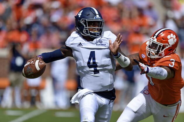 Georgia Southern quarterback Shai Werts (4) is pressured by Clemson's Xavier Thomas during the first half of an NCAA college football game Saturday, Sept. 15, 2018, in Clemson, S.C. (AP Photo/Richard Shiro)