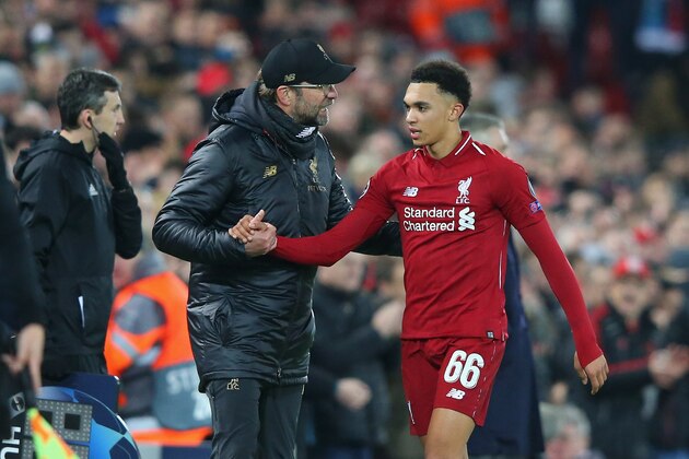 LIVERPOOL, ENGLAND - DECEMBER 11:  Jurgen Klopp the manager of Liverpool shakes hands with Trent Alexander-Arnold after he was substituted during the UEFA Champions League Group C match between Liverpool and SSC Napoli at Anfield on December 11, 2018 in Liverpool, United Kingdom.  (Photo by Alex Livesey - Danehouse/Getty Images)
