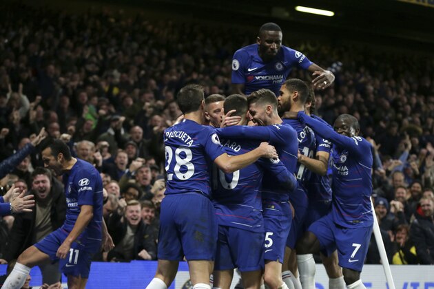 Chelsea's David Luiz, left, celebrates with his teammates after scoring his side's second goal during the English Premier League soccer match between Chelsea and Manchester City at Stamford Bridge in London, Saturday Dec. 8, 2018. (AP Photo/Tim Ireland)