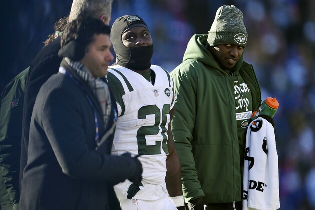 New York Jets running back Isaiah Crowell (20) is escorted from the field after an injury during the first half of an NFL football game, Sunday, Dec. 9, 2018, in Orchard Park, N.Y. (AP Photo/Adrian Kraus)