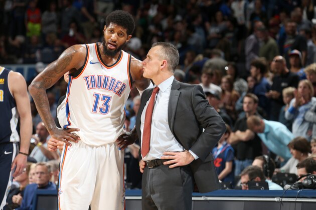 OKLAHOMA CITY, OK - MARCH 30: Paul George #13 and Head Coach Billy Donovan of the Oklahoma City Thunder talk during the game against the Denver Nuggets on March 30, 2018 at Chesapeake Energy Arena in Oklahoma City, Oklahoma. NOTE TO USER: User expressly acknowledges and agrees that, by downloading and/or using this photograph, user is consenting to the terms and conditions of the Getty Images License Agreement. Mandatory Copyright Notice: Copyright 2018 NBAE (Photo by Layne Murdoch/NBAE via Getty Images)