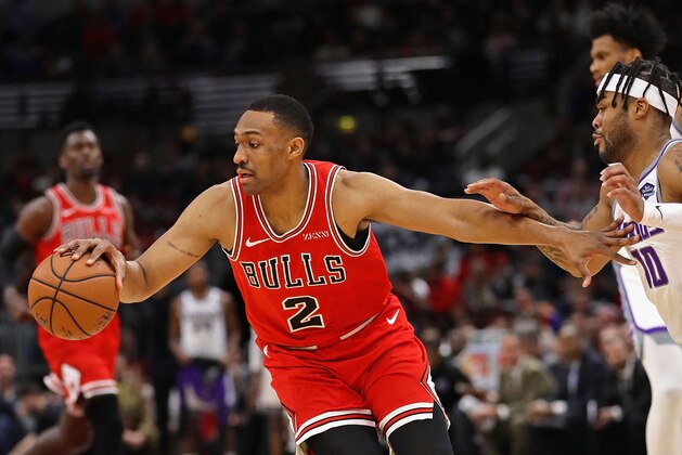 CHICAGO, ILLINOIS - DECEMBER 10: Jabari Parker #2 of the Chicago Bulls moves away from Frank Mason III #10 of the Sacramento Kings at the United Center on December 10, 2018 in Chicago, Illinois. NOTE TO USER: User expressly acknowledges and agrees that, by downloading and or using this photograph, User is consenting to the terms and conditions of the Getty Images License Agreement.  (Photo by Jonathan Daniel/Getty Images)