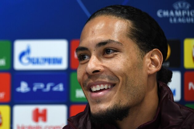 Liverpool's Dutch defender Virgil van Dijk takes part in a press conference on the eve of their Champions league group stage football match against Napoli at Anfield stadium in Liverpool, north west England on December 10, 2018. (Photo by Paul ELLIS / AFP)        (Photo credit should read PAUL ELLIS/AFP/Getty Images)