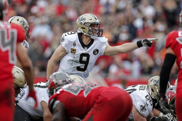 TAMPA, FL - DECEMBER 9: Quarterback Drew Brees #9 of the New Orleans Saints changes the play at the line of scrimmage during the game against the Tampa Bay Buccaneers at Raymond James Stadium on December 9, 2018 in Tampa, Florida. The Saints defeated the Buccaneers 28 to 14 to win the NFC South conference title. (Photo by Don Juan Moore/Getty Images)